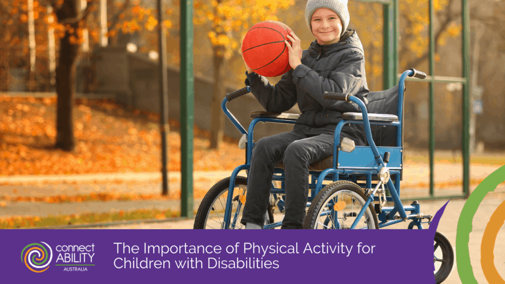 A young boy in a wheelchair smiling while holding a basketball outdoors