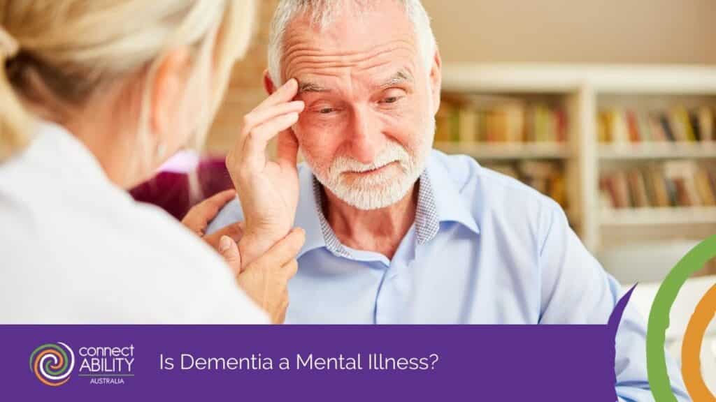 An elderly man with a white beard looking confused and touching his temple while a healthcare worker holds his