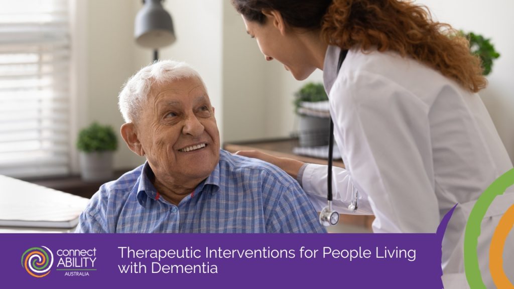 A smiling elderly man looking up at a female doctor in a white coat with a stethoscope