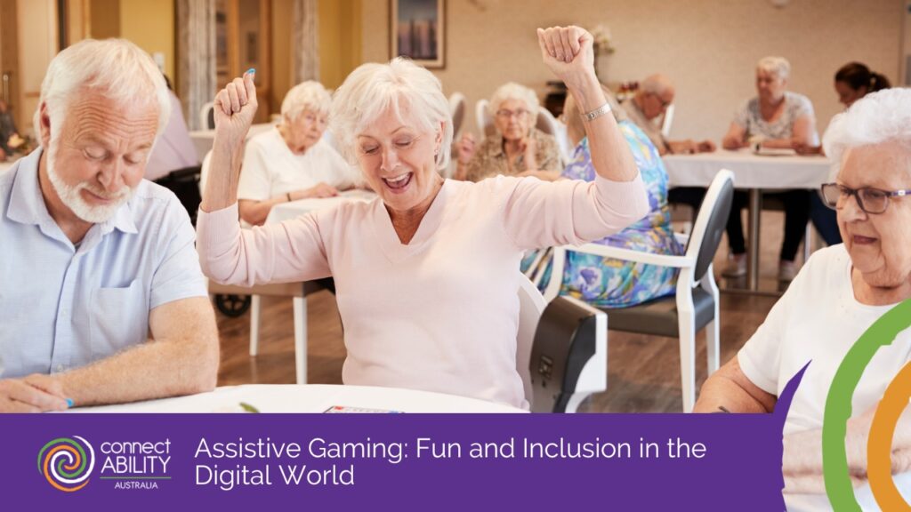An elderly woman cheers with her arms raised while playing a game with other seniors at a community centre table.
