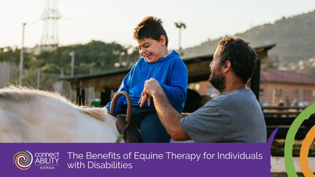 A young boy laughs joyfully while sitting on a white horse during a therapy session, supported by a man standing beside him.